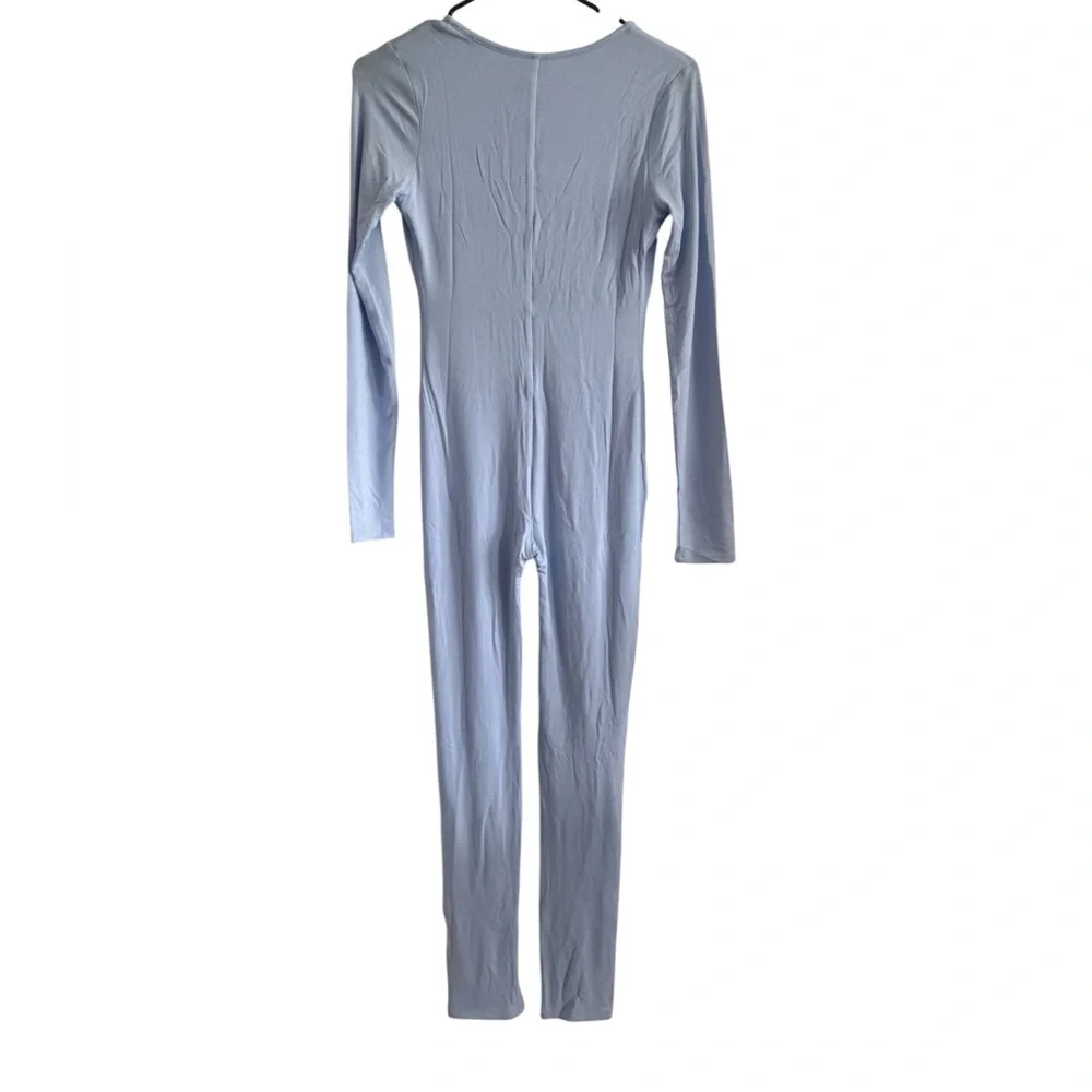 NWT Naked Wardrobe Light Blue Jumpsuit M V Neck Bodycon Full Length - Picture 8 of 9